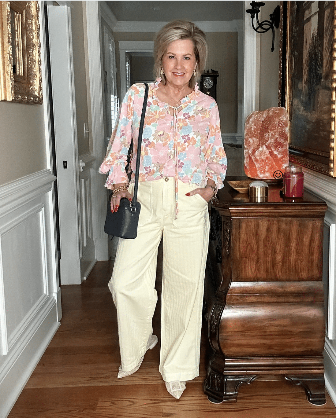 Over 50 Fashion Blogger, Tania Stephens is styling Old Navy clothing - pastel floral top and butter yellow wide leg pants